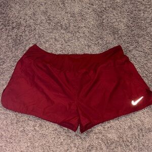 Nike Women's Dark Red Athletic Shorts with Reflective Swoosh